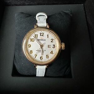 Brand New Shinola 34 mm Birdy Watch
White leather strap